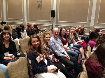 Students from the Honors Program seated in a row.